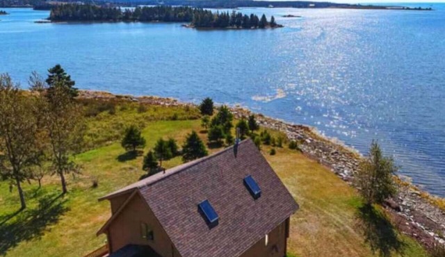 Still Water Shores: Ostrea Oceanside Loghouse in Musquodoboit Harbour