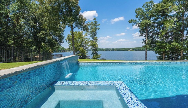 Stunning Lakefront Heated/Cooled Pool Spa Game Room Putting Green Dock