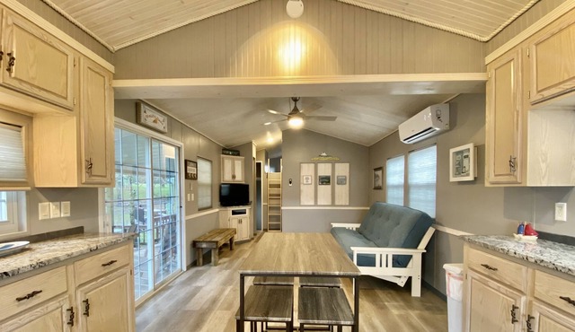 The Sailboat! Lakeside Tiny Cottage with private dock and firepit!