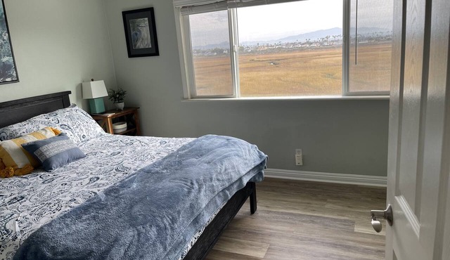 Third story condo with tiny beach view. Across from ocean and on estuary. in Imperial Beach