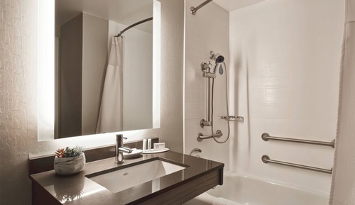 Suite, 1 King Bed with Sofa bed (Mobility/Hearing Accessible, Tub)