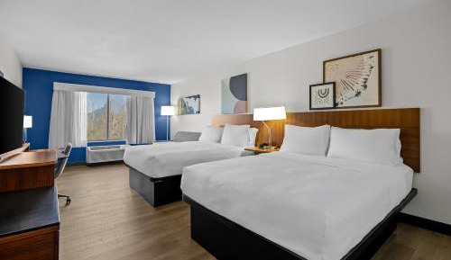 Queen Room with Two Queen Beds and Sofa Bed