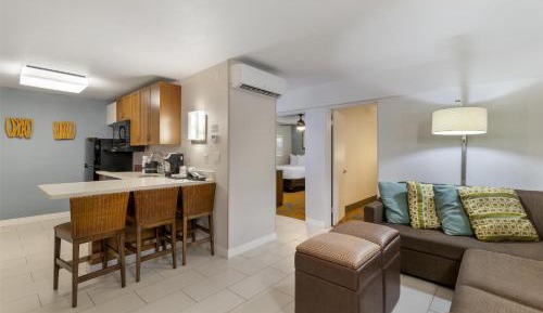 Two-Bedroom Suite with One King and Two Double Beds, Sofa Bed and Full Kitchen - Non-Smoking
