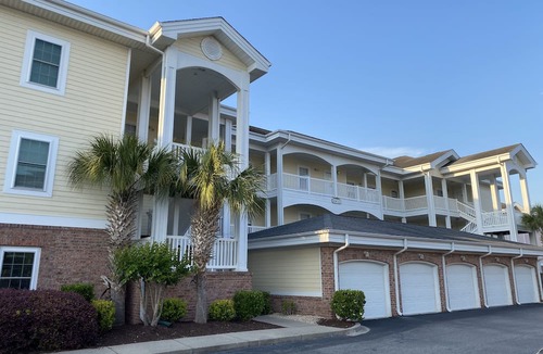 Central Myrtle Beach Condo | 1st Floor Unit W/Patio, Golf Course and Pool View, less than 10 Min to the Beach