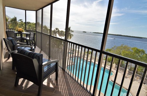 Punta Rassa Condo | Sanibel Harbour Resort Bay View Tower 331: Beachfront corner condo with stunning sunsets