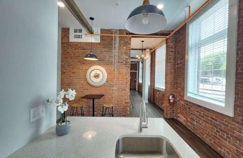 College Hill Apartment | Jennifer's Historic Loft Glass Bedroom