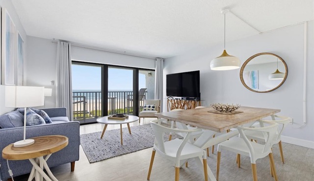 Oceanfront condo with stunning views. Steps to Cocoa Beach Pier! 🌴🌊